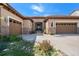 Home with 3-car garage and stone accents at 9005 Stonecrest Way, Highlands Ranch, CO 80129