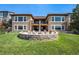 Stunning two-story home with stone exterior and fire pit at 9005 Stonecrest Way, Highlands Ranch, CO 80129