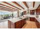 Modern kitchen with white countertops and wooden cabinets at 9005 Stonecrest Way, Highlands Ranch, CO 80129