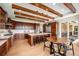 Gourmet kitchen with wooden cabinets and large island at 9005 Stonecrest Way, Highlands Ranch, CO 80129