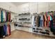 Bright walk-in closet with ample shelving and hanging space at 9005 Stonecrest Way, Highlands Ranch, CO 80129