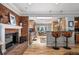 Inviting open-concept kitchen featuring stainless steel appliances, and cozy barstool seating for entertaining at 4011 S Ivy Ln, Cherry Hills Village, CO 80111