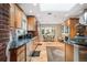 Spacious kitchen with modern appliances, granite countertops, and a cozy breakfast nook with natural light at 4011 S Ivy Ln, Cherry Hills Village, CO 80111