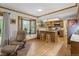 Inviting kitchen with wood cabinets, granite countertops, and stainless steel appliances at 6222 S Ames Ct, Littleton, CO 80123