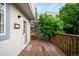 Wooden back deck and wooden railings, perfect for outdoor enjoyment at 9946 W Cornell Pl, Lakewood, CO 80227