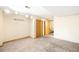 Finished basement with a neutral carpet and closet space at 9946 W Cornell Pl, Lakewood, CO 80227