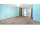 Bedroom features neutral carpeting and a closet at 9946 W Cornell Pl, Lakewood, CO 80227
