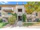 Charming exterior view of a multi-Gathering home with manicured landscaping at 430 Zang St # 4-102, Lakewood, CO 80228