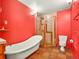 Classic bathroom featuring a clawfoot tub and separate shower at 8791 Grizzly Way, Evergreen, CO 80439