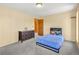 Bedroom with neutral walls and gray carpet at 8791 Grizzly Way, Evergreen, CO 80439