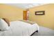 Bright bedroom with a fireplace and outdoor access at 8791 Grizzly Way, Evergreen, CO 80439