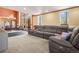 Spacious living room with large windows and comfortable seating at 8791 Grizzly Way, Evergreen, CO 80439