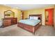 Spacious main bedroom with warm tones and lots of storage at 8791 Grizzly Way, Evergreen, CO 80439