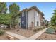 Exterior view of the home featuring contemporary architecture and landscaping at 9300 E Florida Ave # 906, Denver, CO 80247