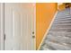 Foyer featuring a white door, and stairs with gray carpeting leading up at 9300 E Florida Ave # 906, Denver, CO 80247