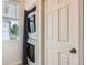 Convenient laundry closet with stacked washer and dryer units at 9300 E Florida Ave # 906, Denver, CO 80247