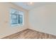 Cozy bedroom featuring a large window that floods the room with natural light at 1755 Peak Loop, Broomfield, CO 80023