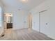 Large bedroom with sliding door closet and ensuite bathroom entrance at 1755 Peak Loop, Broomfield, CO 80023
