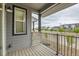 This relaxing patio features wood floors and community views at 1755 Peak Loop, Broomfield, CO 80023