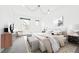 Bright main bedroom with neutral decor, large window, and modern furnishings at 553 N Logan St, Denver, CO 80203