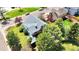 Overhead perspective of the property featuring mature trees and outdoor living spaces at 8133 W Quarto Ave, Littleton, CO 80128