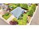 Aerial view of the home showcasing the backyard, deck, and surrounding neighborhood at 8133 W Quarto Ave, Littleton, CO 80128