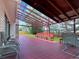 Spacious outdoor deck with comfortable seating and a view of the backyard at 8133 W Quarto Ave, Littleton, CO 80128