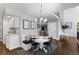 Charming dining area with a built-in bench, round table and stylish decor at 5955 Blue Sage Way, Littleton, CO 80123