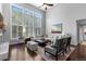 Spacious living area features high ceilings and clerestory windows creating a light-filled interior at 5955 Blue Sage Way, Littleton, CO 80123