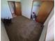 Spacious bedroom with carpet flooring, dual closets, and neutral walls at 3136 S Cathay Cir, Aurora, CO 80013