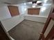 Bedroom with paneled lower walls and wooden blinds at 3136 S Cathay Cir, Aurora, CO 80013