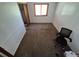 Bedroom with carpet flooring, window, and closet at 3136 S Cathay Cir, Aurora, CO 80013