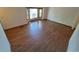 Inviting living room with a large bay window, offering plenty of sunlight at 3136 S Cathay Cir, Aurora, CO 80013