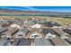 Bird's eye view of a new residential community with mountain and lake views, highlighting the area's natural beauty at 11492 Stonewash St, Littleton, CO 80125