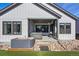 Home's backyard featuring a covered patio with hot tub, perfect for relaxation and outdoor enjoyment at 11492 Stonewash St, Littleton, CO 80125
