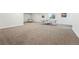 Spacious basement area featuring neutral carpet, recessed lights, and space for activities at 11492 Stonewash St, Littleton, CO 80125