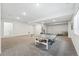 Large basement area with space for recreation featuring neutral carpet and recessed lighting at 11492 Stonewash St, Littleton, CO 80125