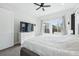 Bright and airy bedroom with large windows and a comfortable king-size bed at 11492 Stonewash St, Littleton, CO 80125