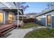 Spacious backyard with patio, well-manicured lawn, and detached garage at 418 S Gilpin St, Denver, CO 80209