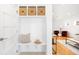 Well-organized entryway with built-in storage, seating, and modern design at 418 S Gilpin St, Denver, CO 80209