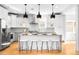 Modern kitchen with granite countertops, stainless steel appliances, and island seating at 418 S Gilpin St, Denver, CO 80209