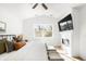 This main bedroom features a fireplace, vaulted ceiling, and a ceiling fan at 418 S Gilpin St, Denver, CO 80209
