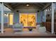 Inviting outdoor patio with stylish seating, fire pit, and sliding glass doors at 418 S Gilpin St, Denver, CO 80209