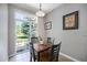 Cozy breakfast nook bathed in natural light offering a peaceful space to enjoy meals overlooking the backyard at 2550 Winding River Dr # E1, Broomfield, CO 80023