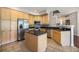 Spacious kitchen featuring granite countertops, stainless steel appliances, and an island at 2550 Winding River Dr # E1, Broomfield, CO 80023