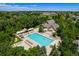 Aerial view of community pool and clubhouse at 2550 Winding River Dr # E1, Broomfield, CO 80023