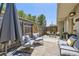 Inviting backyard patio featuring a seating set, dining set and a privacy fence at 2841 N Columbine St, Denver, CO 80205
