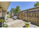 Inviting backyard patio featuring an outdoor dining set and a privacy fence at 2841 N Columbine St, Denver, CO 80205