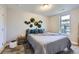 Cozy bedroom with natural light, carpet flooring, and unique wall decor at 2841 N Columbine St, Denver, CO 80205