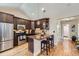 Modern kitchen with granite counters, stainless steel appliances, and a breakfast bar for casual dining at 2841 N Columbine St, Denver, CO 80205
